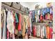 Walk-in closet offers ample storage with shelves and hanging rods for organizing clothes and accessories at 2599 E San Mateo Dr, Casa Grande, AZ 85194