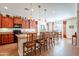 Spacious kitchen with island bar seating and stainless steel sink at 2599 E San Mateo Dr, Casa Grande, AZ 85194