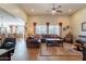 Cozy living area with a large sectional sofa, dining area, and plenty of natural light at 2599 E San Mateo Dr, Casa Grande, AZ 85194
