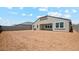 Spacious backyard offering potential for landscaping and outdoor activities at 2640 W Stanton Ave, Apache Junction, AZ 85120