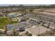 Aerial view of community amenities, including a pool, tennis court, and basketball court at 3279 W Molino Rd, San Tan Valley, AZ 85144