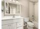 Bathroom with vanity, large mirror, and a shower/tub combo at 3307 E Roveen Ave, Phoenix, AZ 85032