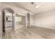 Bedroom featuring arched doorways and sliding mirror door closet at 3307 E Roveen Ave, Phoenix, AZ 85032