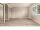 Empty bedroom featuring modern ceiling fan, neutral paint, and lots of natural light at 3307 E Roveen Ave, Phoenix, AZ 85032