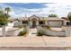 Charming single-story home with a landscaped front yard and inviting entryway at 3307 E Roveen Ave, Phoenix, AZ 85032