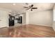 Spacious living room with hardwood floors and ceiling fan at 3307 E Roveen Ave, Phoenix, AZ 85032