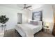 Comfortable bedroom with neutral decor, featuring a large window and ample space at 3330 E Cypress St, Phoenix, AZ 85008
