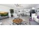 Open-concept living room blending seamlessly with the kitchen and dining area at 3330 E Cypress St, Phoenix, AZ 85008