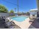 Outdoor pool area, great for relaxation with comfortable seating around the pool at 3330 E Cypress St, Phoenix, AZ 85008