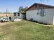 Backyard with pool, lawn, and seating area at 3341 E Cochise Rd, Phoenix, AZ 85028
