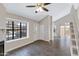 The spacious living room features a soaring ceiling, fireplace, and tile floors, providing natural light at 3491 N Arizona Ave # 174, Chandler, AZ 85225