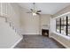A bright room features a fireplace, tile floor, and large windows which adds architectural details to the living space at 3491 N Arizona Ave # 174, Chandler, AZ 85225
