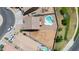 Aerial view of the private backyard with a beautiful pool, deck, and spacious yard at 36265 W Alhambra St, Maricopa, AZ 85138