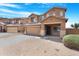 Inviting two-story home with a well-manicured front yard and attached garage at 36265 W Alhambra St, Maricopa, AZ 85138