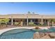 This backyard has a pool, spa and covered patio creating the perfect oasis at 3731 E Halifax Cir, Mesa, AZ 85205