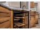 Kitchen prep area with a sink, stone countertop, and a built in wine refrigerator at 3731 E Halifax Cir, Mesa, AZ 85205