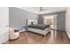 Primary bedroom showcasing ample space, a large bed, and sliding glass doors to the backyard at 4024 W Griswold Rd, Phoenix, AZ 85051