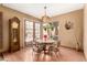 Dining room featuring a table and four chairs beneath a unique chandelier at 4024 W Griswold Rd, Phoenix, AZ 85051