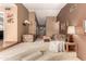 Unique living room with split-level floor, cozy seating, and open floor plan at 4024 W Griswold Rd, Phoenix, AZ 85051