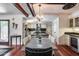 Elegant dining space with chandelier lighting, wood floors, and a view to the kitchen at 4242 N 44Th St, Phoenix, AZ 85018