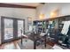 Spacious office area with hardwood floors and French doors, offering plenty of natural light at 4242 N 44Th St, Phoenix, AZ 85018