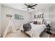 Well-lit bedroom with a decorative wall accent, a comfy bed, and a playful teepee for a retreat at 4320 N 35Th St, Phoenix, AZ 85018