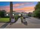 Charming single-story home featuring a well-manicured lawn and a brick driveway leading to an attached garage at 4320 N 35Th St, Phoenix, AZ 85018