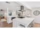 Bright and airy kitchen with an island, stainless appliances, and a view into the living area at 4320 N 35Th St, Phoenix, AZ 85018