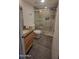 Elegant bathroom featuring a glass-enclosed shower, modern fixtures, and sleek vanity at 4704 E Paradise Village N Pkwy # 211, Phoenix, AZ 85032