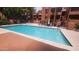 A spacious community pool offers residents a relaxing retreat on sunny days at 4704 E Paradise Village N Pkwy # 211, Phoenix, AZ 85032