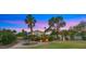 Expansive backyard featuring lush landscaping, outdoor seating, and a well-manicured lawn, perfect for entertaining at 4824 E Hummingbird Ln, Paradise Valley, AZ 85253