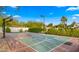 Private backyard basketball court with a modern design and lush landscaping, providing a perfect space for recreation at 4824 E Hummingbird Ln, Paradise Valley, AZ 85253
