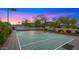 Private backyard basketball court with lighting, offering recreation and fitness opportunities at 4824 E Hummingbird Ln, Paradise Valley, AZ 85253