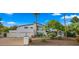 Beautiful single-Gathering home with a well-manicured lawn and mature trees at 4824 E Hummingbird Ln, Paradise Valley, AZ 85253