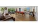 Bright game room with a pool table, hardwood floors, comfortable seating, and large windows with scenic views at 4824 E Hummingbird Ln, Paradise Valley, AZ 85253