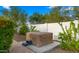 Backyard hot tub with surrounding greenery at 4824 E Hummingbird Ln, Paradise Valley, AZ 85253