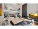 Open living space features a soaring fireplace, vaulted ceilings and a loft space above at 4824 E Hummingbird Ln, Paradise Valley, AZ 85253
