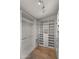 Custom walk-in closet with built-in shelving and drawers for optimal storage at 4824 E Hummingbird Ln, Paradise Valley, AZ 85253