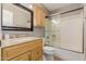 Traditional bathroom featuring granite countertops and a shower with sliding glass doors at 520 N Stapley Dr # 117, Mesa, AZ 85203