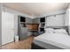 Cozy bedroom with custom built-in desk and storage, providing workspace and comfort at 520 N Stapley Dr # 117, Mesa, AZ 85203