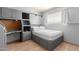 Bedroom featuring built-in desk and drawers and a window at 520 N Stapley Dr # 117, Mesa, AZ 85203
