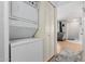Convenient laundry area with stacked washer and dryer, maximizing space and efficiency at 520 N Stapley Dr # 117, Mesa, AZ 85203