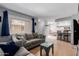 Inviting living room that seamlessly connects to the dining area and kitchen, perfect for entertaining at 520 N Stapley Dr # 117, Mesa, AZ 85203