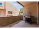 Relaxing covered patio featuring a grill, perfect for outdoor cooking and entertaining at 520 N Stapley Dr # 117, Mesa, AZ 85203