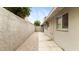 Spacious backyard showcasing a mix of materials in an inviting design, adjacent to the home's exterior at 524 W Fairway Dr # 10, Mesa, AZ 85201