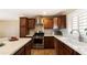 Bright kitchen featuring stainless steel appliances, sleek countertops, and light backsplash at 524 W Fairway Dr # 10, Mesa, AZ 85201