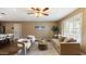 Living room showcasing neutral colors, comfortable seating, and natural light from window at 524 W Fairway Dr # 10, Mesa, AZ 85201