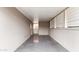 An enclosed patio area featuring bright, neutral tones and access to the outdoors at 524 W Fairway Dr # 10, Mesa, AZ 85201