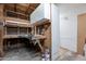Unfinished basement with utility sink, work bench and cabinet at 6121 N 11Th St, Phoenix, AZ 85014