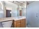 Neutral bathroom with updated vanity and sink, frosted glass shower, and updated fixtures at 6121 N 11Th St, Phoenix, AZ 85014